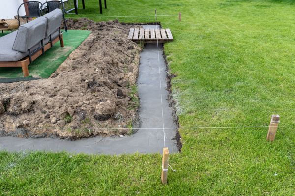 Cement Footer Installation in Daphne